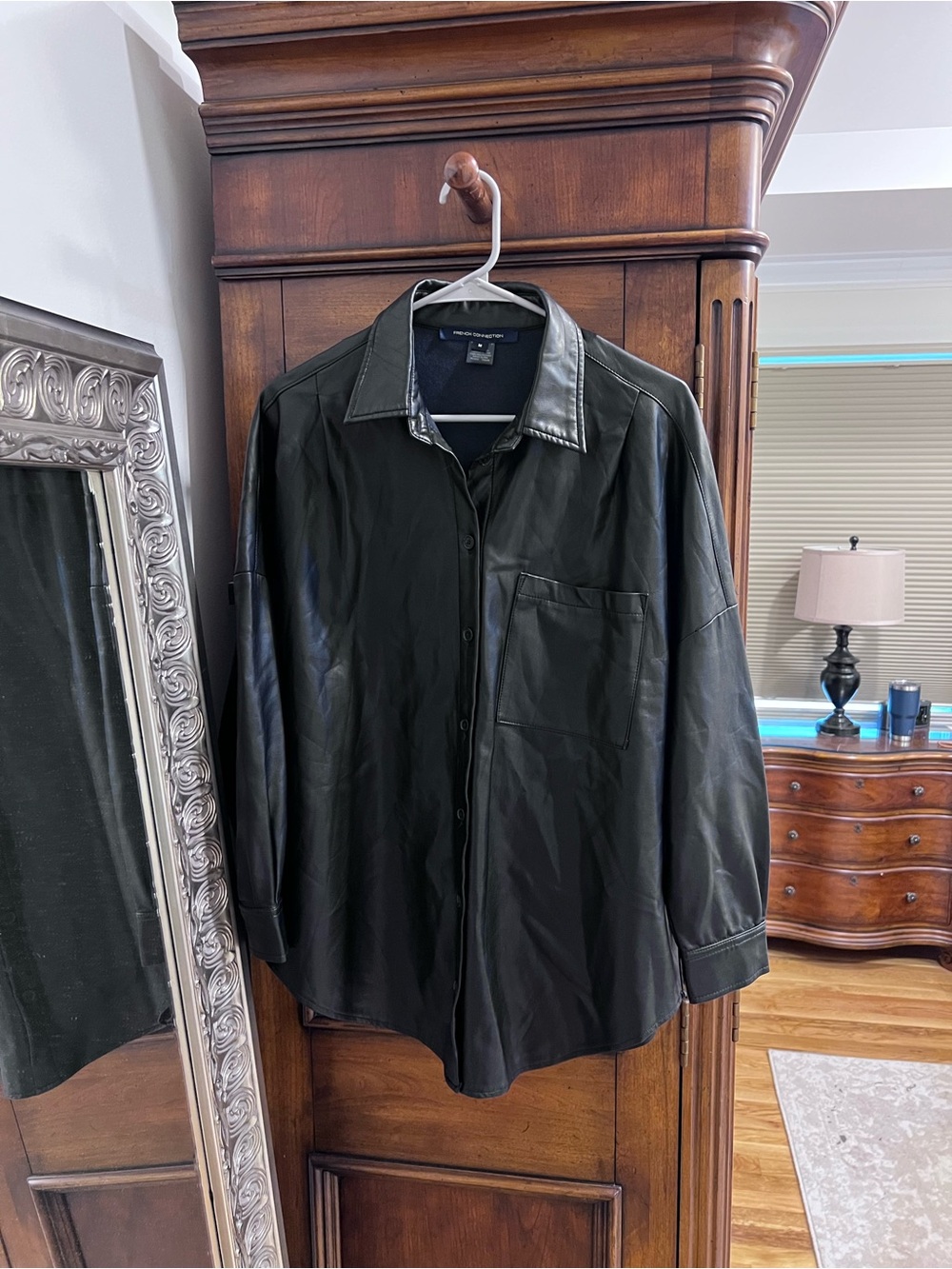 Woman’s Classic Black Leather Button-Up Shirt Jacket